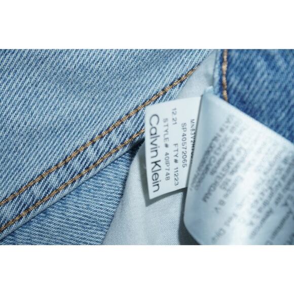 Calvin Klein Jeans Unisex Distressed Denim Cutoff Shorts Blue W30 - Picture 6 of 7